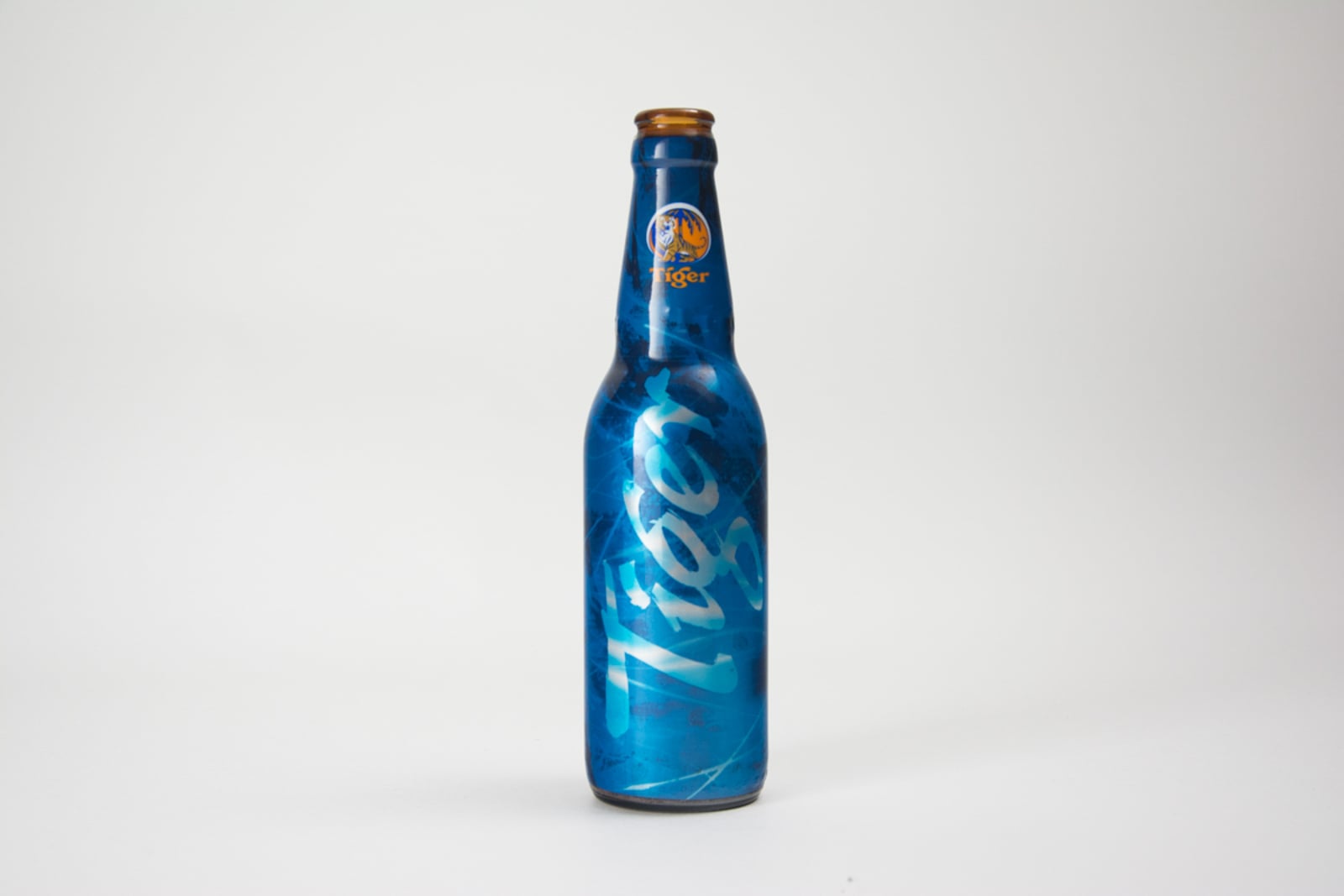 Tiger Beer Bottle In Blue Wrap With Leaf Design