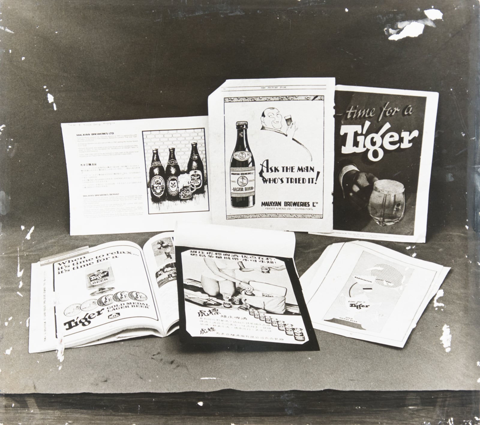 Various Paper Beer Advertisement Photograph